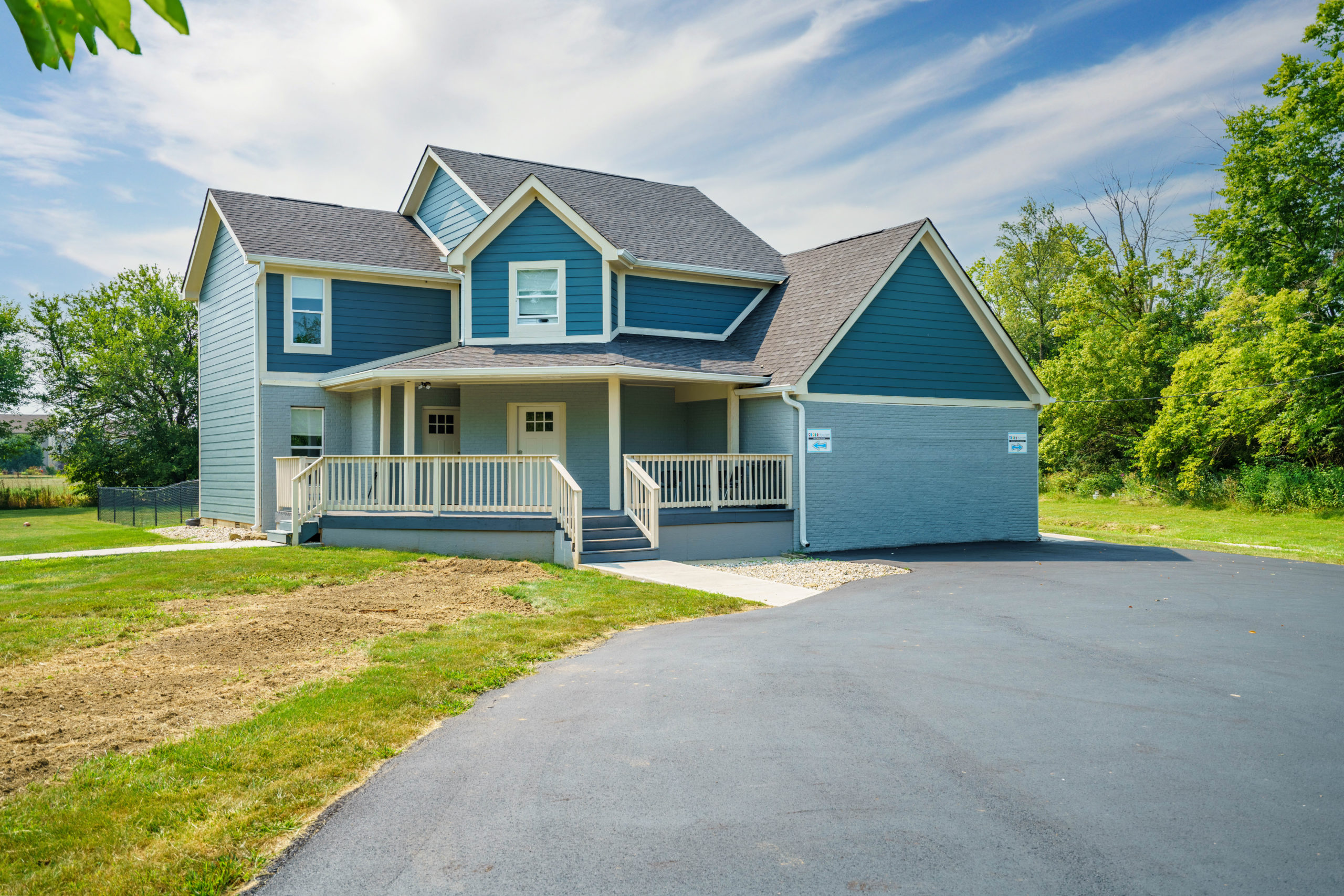A blue two-story house-style ABA building in Brownsburg