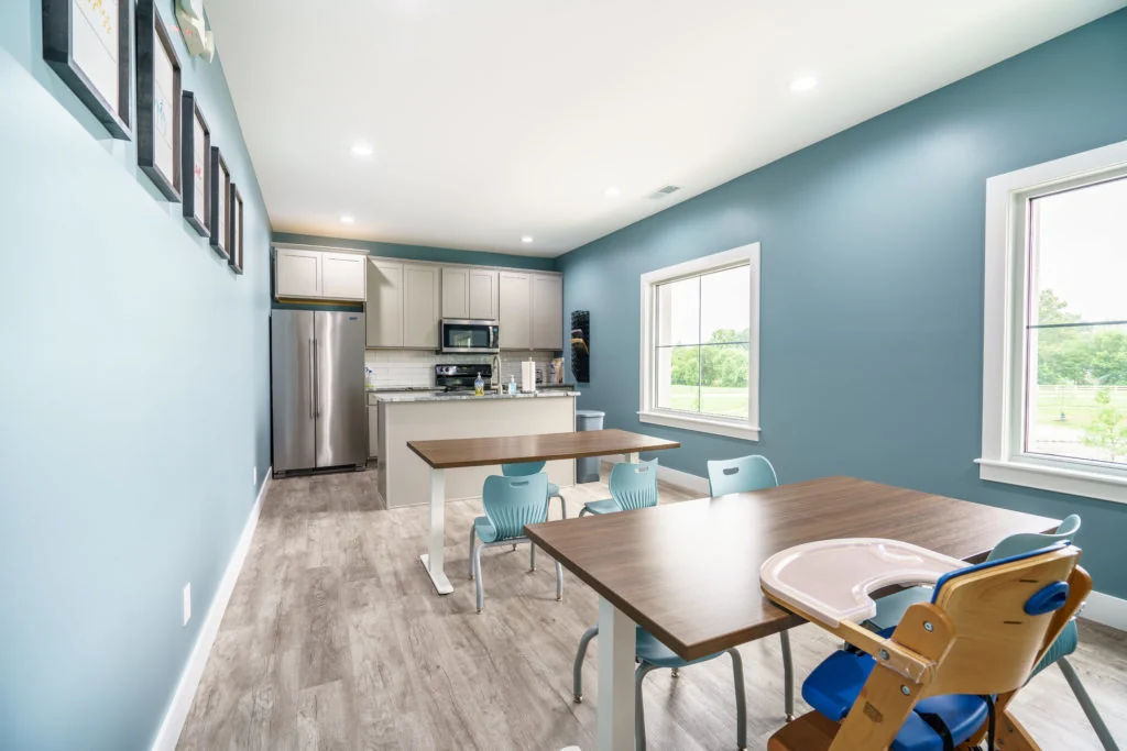 Client kitchen with tables and chairs